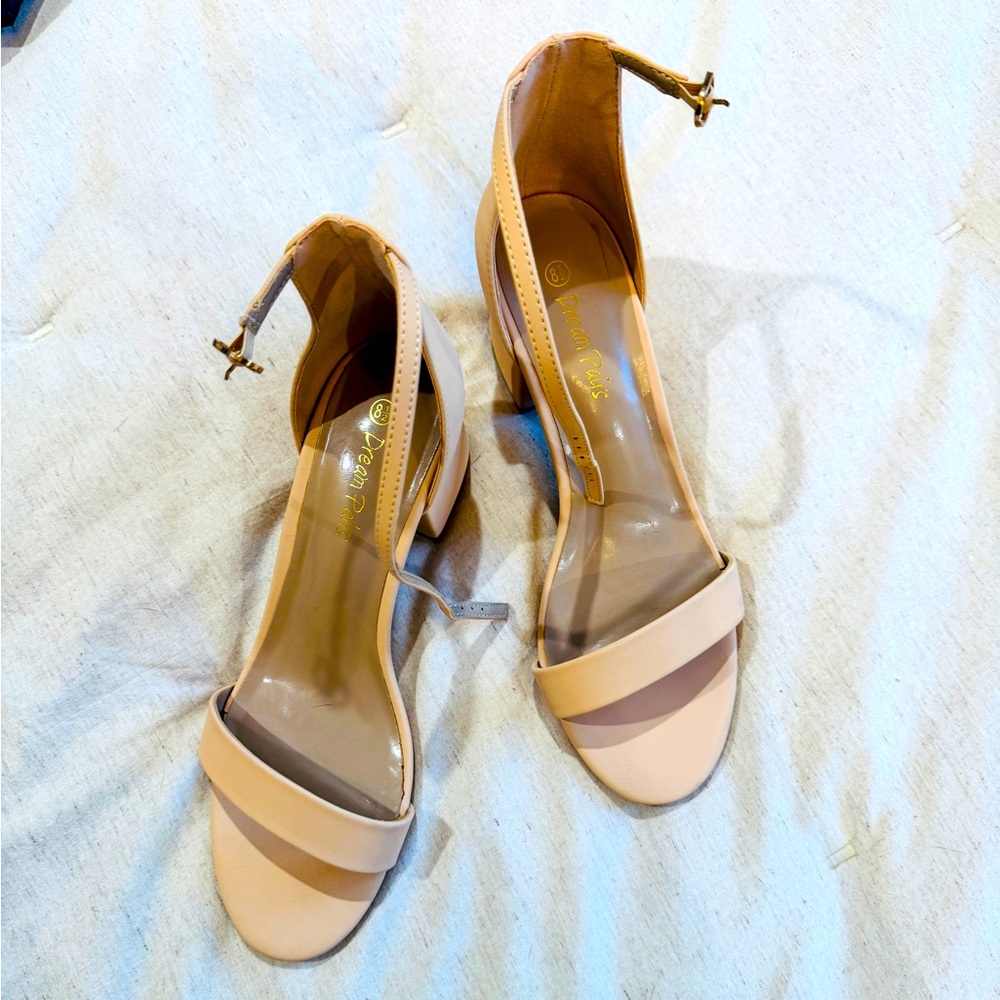 Woman’s nude block heels 
81/2